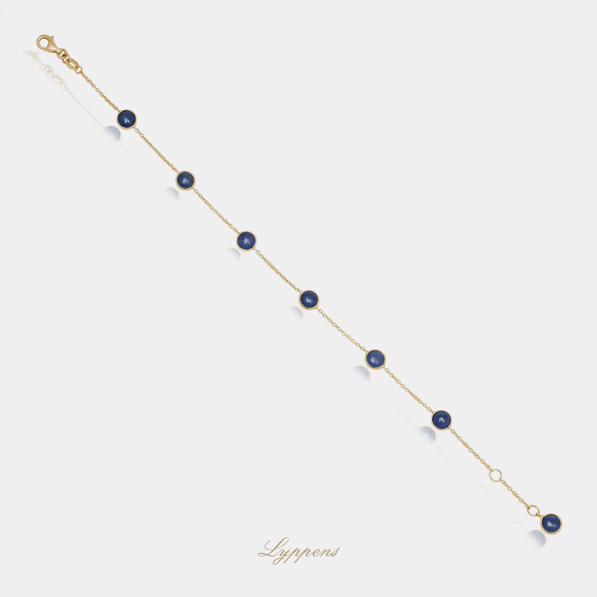 Yellow gold bracelet with sapphire