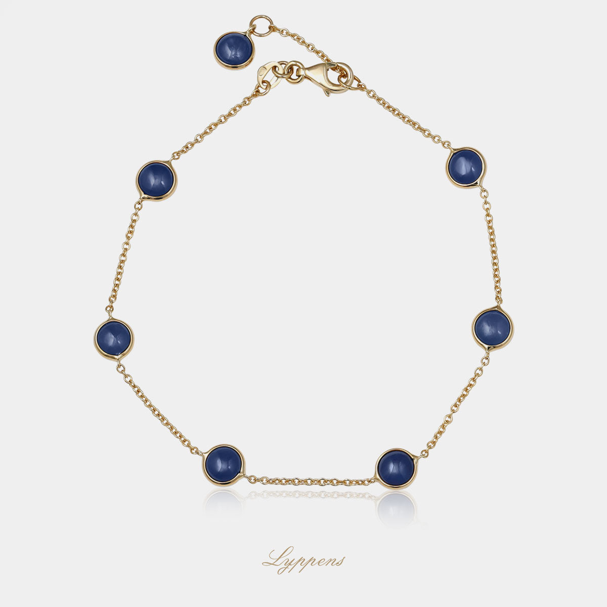 Yellow gold bracelet with sapphire