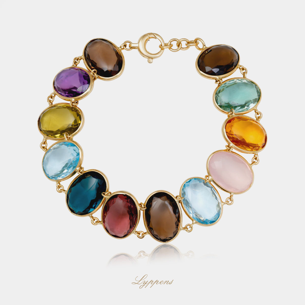 Yellow gold bracelet with various gemstones