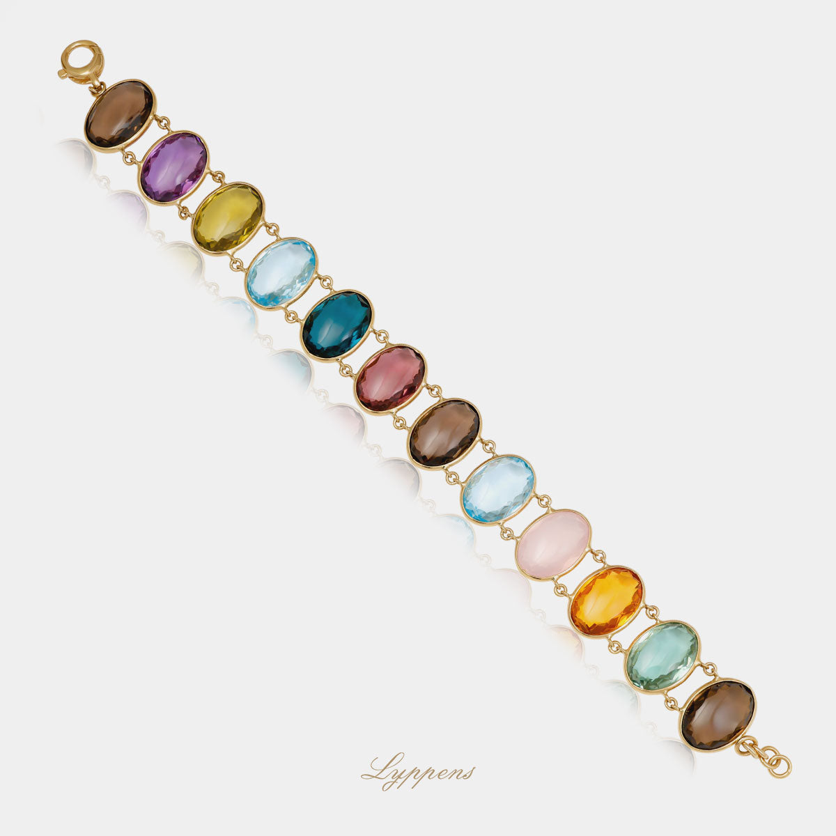 Yellow gold bracelet with various gemstones