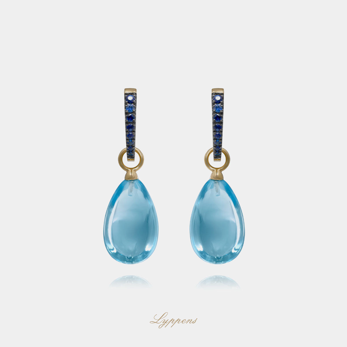 Yellow gold earrings with topaz and sapphire