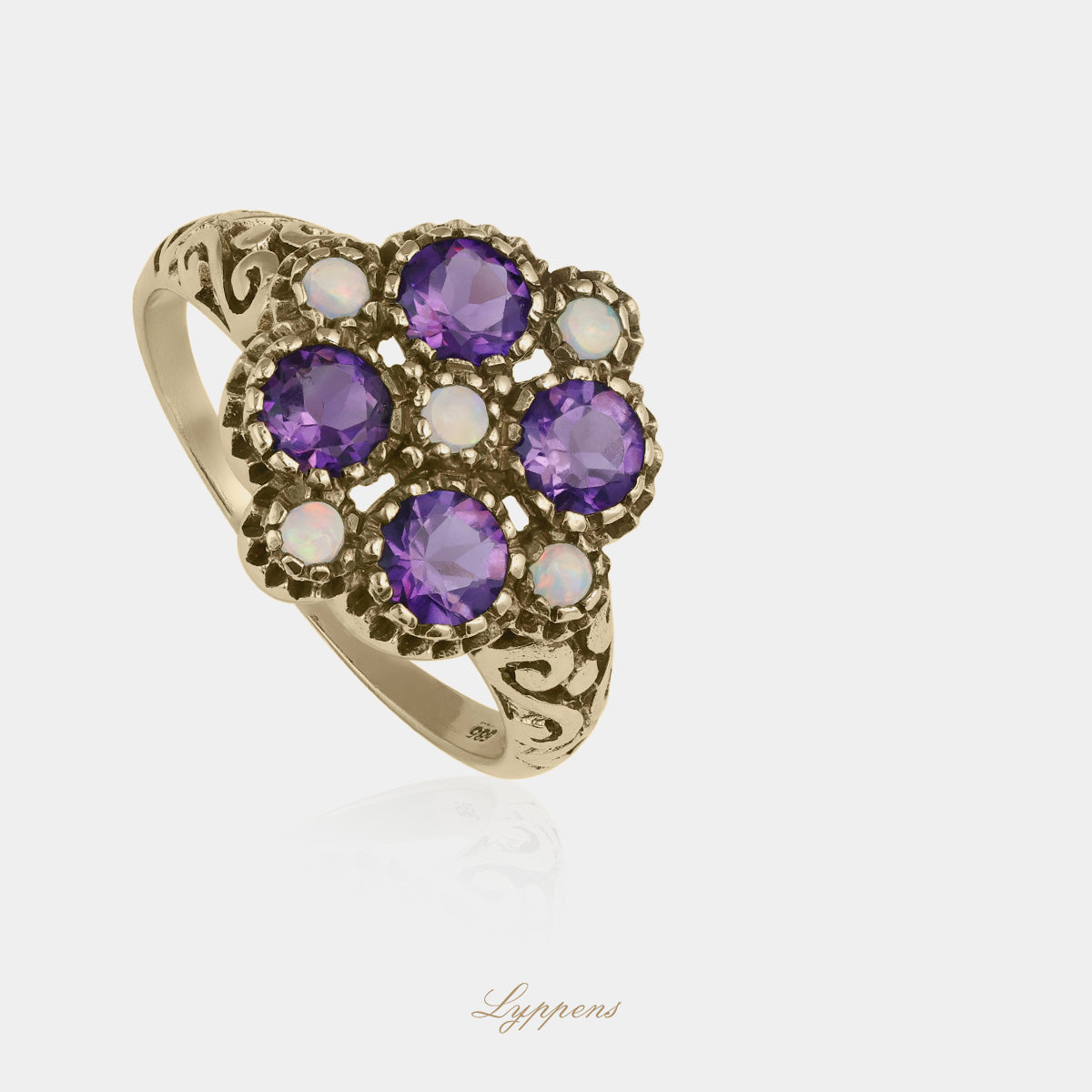 Yellow gold ring with opal and amethyst
