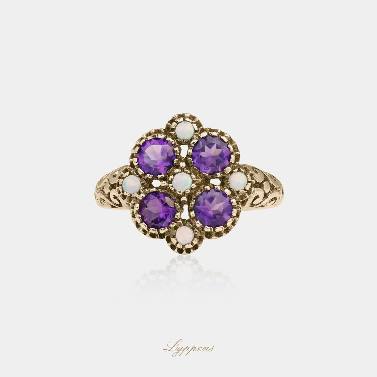 Yellow gold ring with opal and amethyst