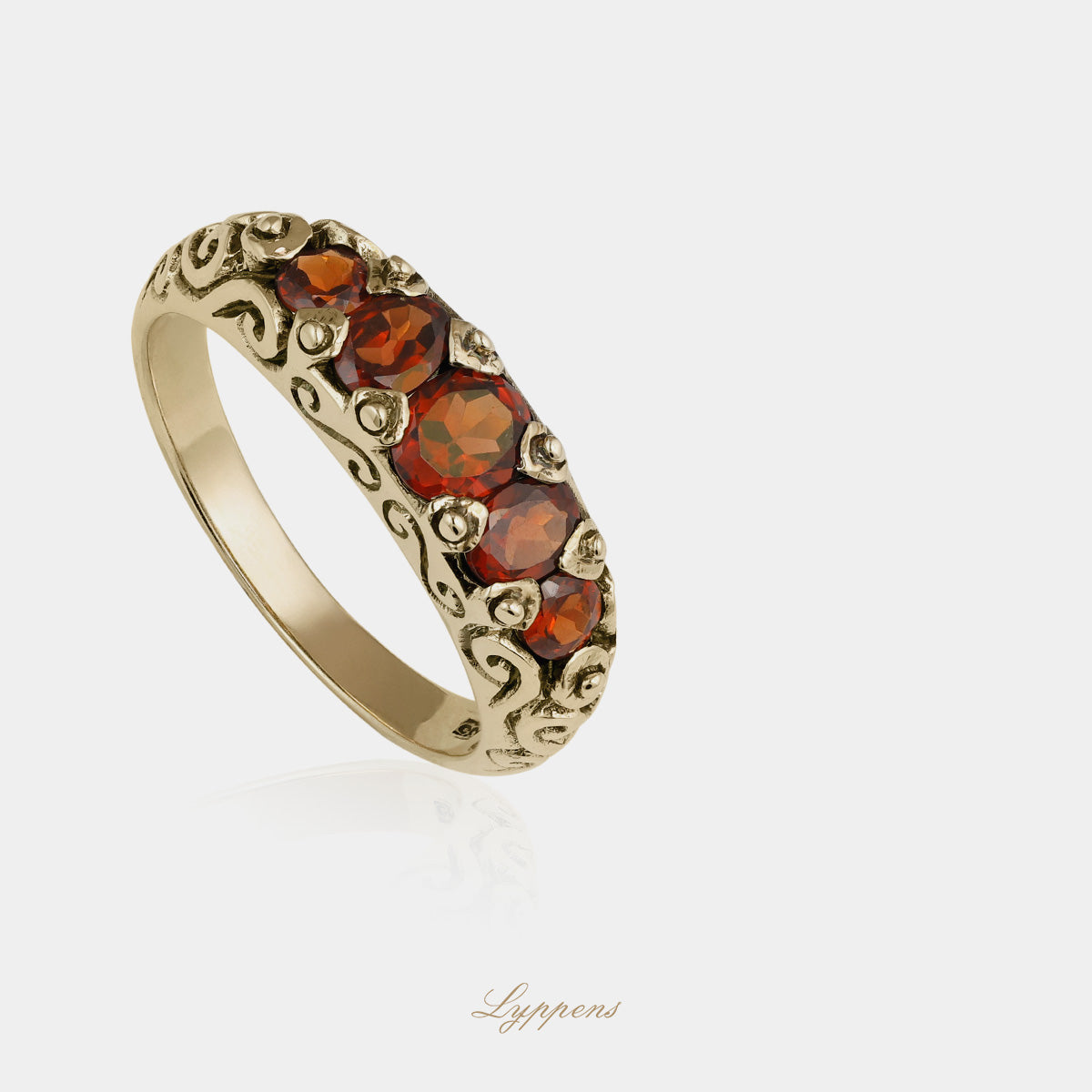 Yellow gold five stone ring with garnet