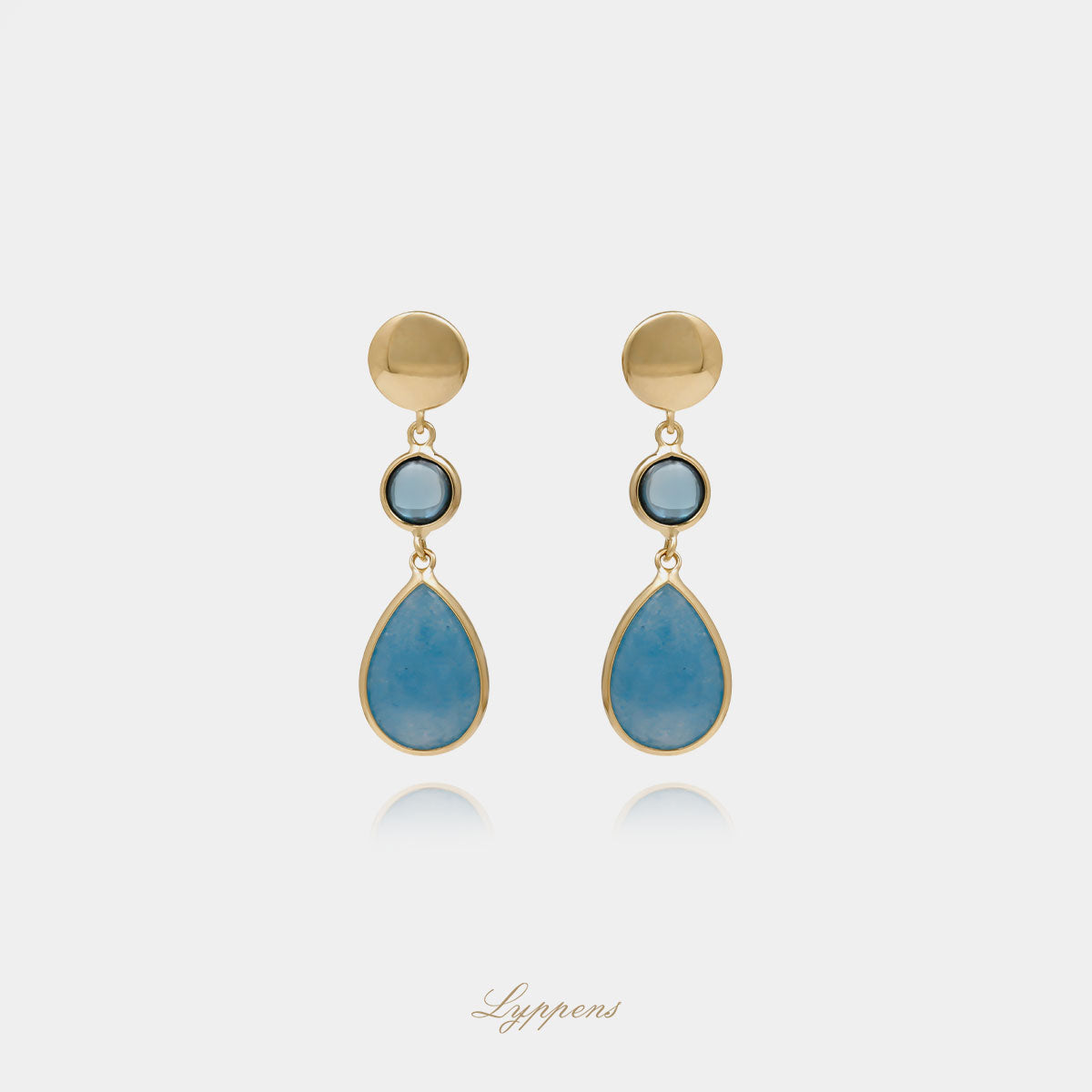 Yellow gold earrings with topaz and quartz