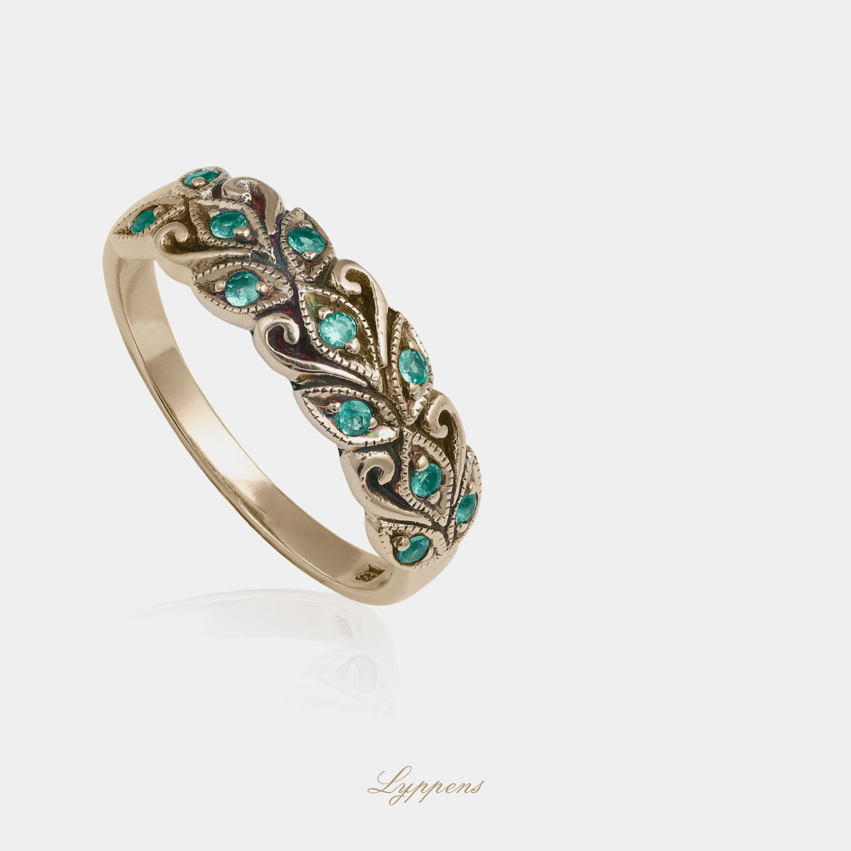 Yellow gold ring with emerald