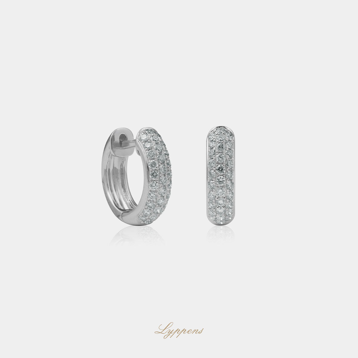 Witgouden oorbellen met diamant 0.54ct