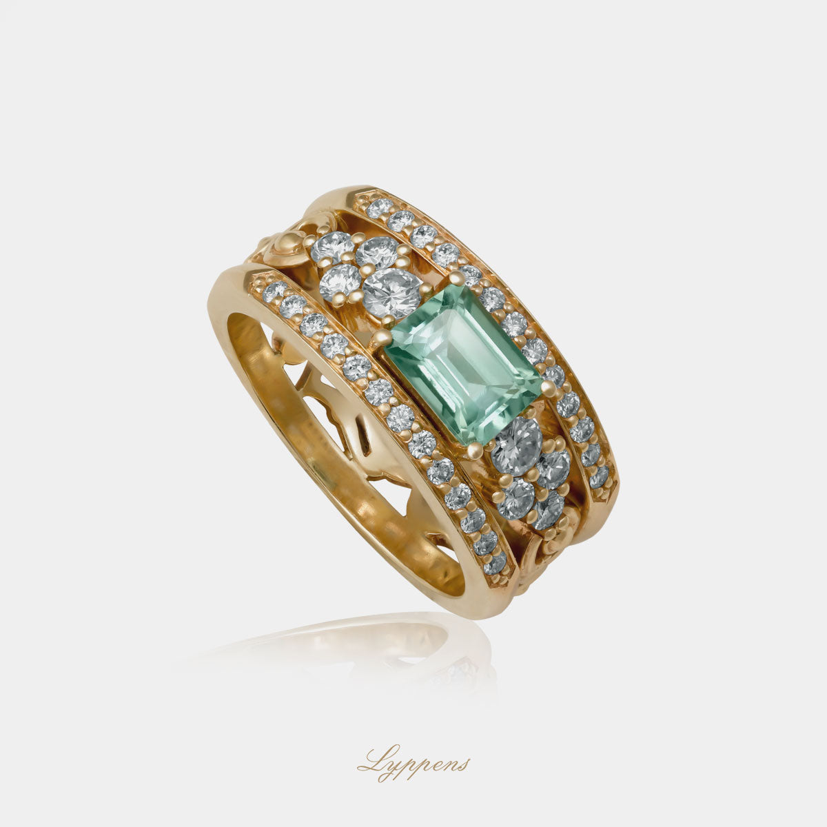 Geelgouden band ring in het midden gezet met een baguette geslepen toermalijn en briljant geslepen diamant.