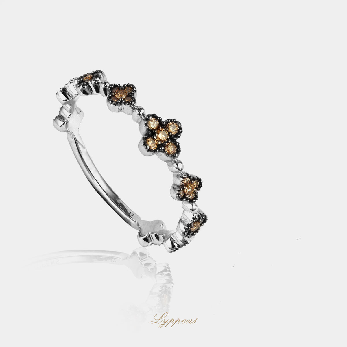 White gold ring with brown diamond