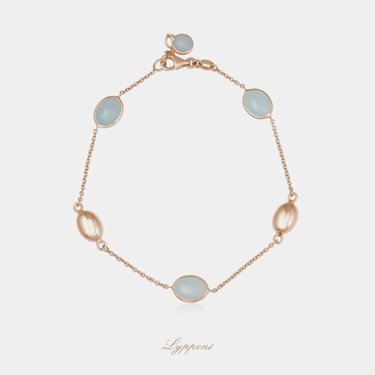 Roségouden anker schakelcollier met gouden elementen en cabochon geslepen auqamarijn.
