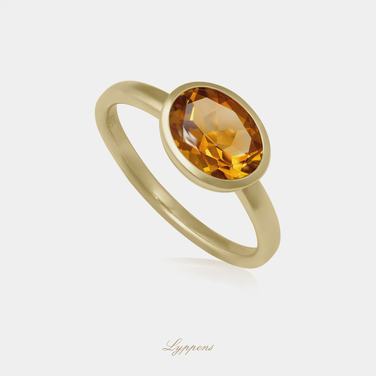 Geelgouden ring in het midden gezet met een ovaal geslepen citrien.