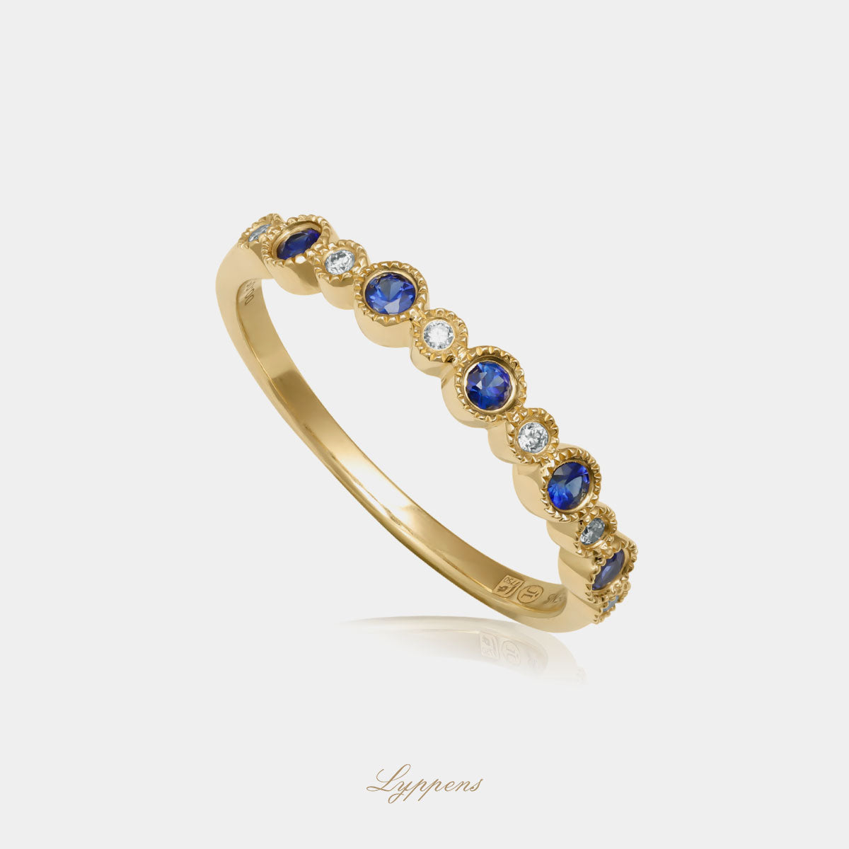 Yellow gold half eternity ring with sapphire and diamonds