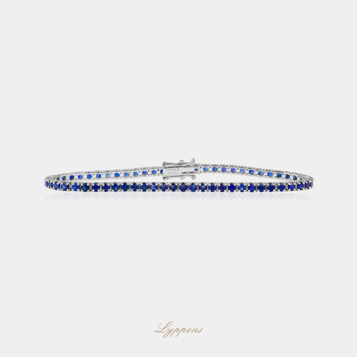 Witgouden tennisarmband met saffier 6.60ct