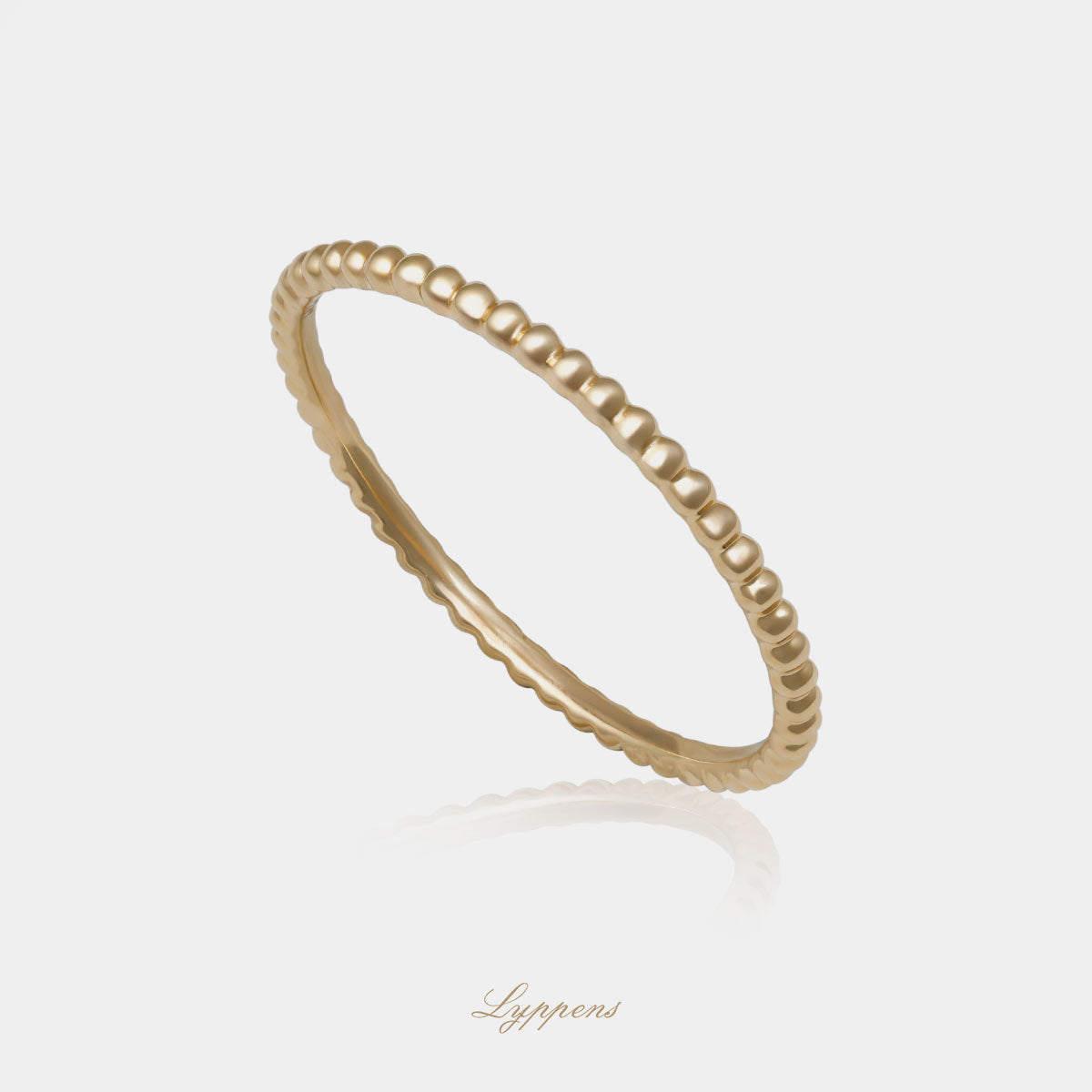 Geelgouden bolletjes ring met een breedte van 1.3mm.
