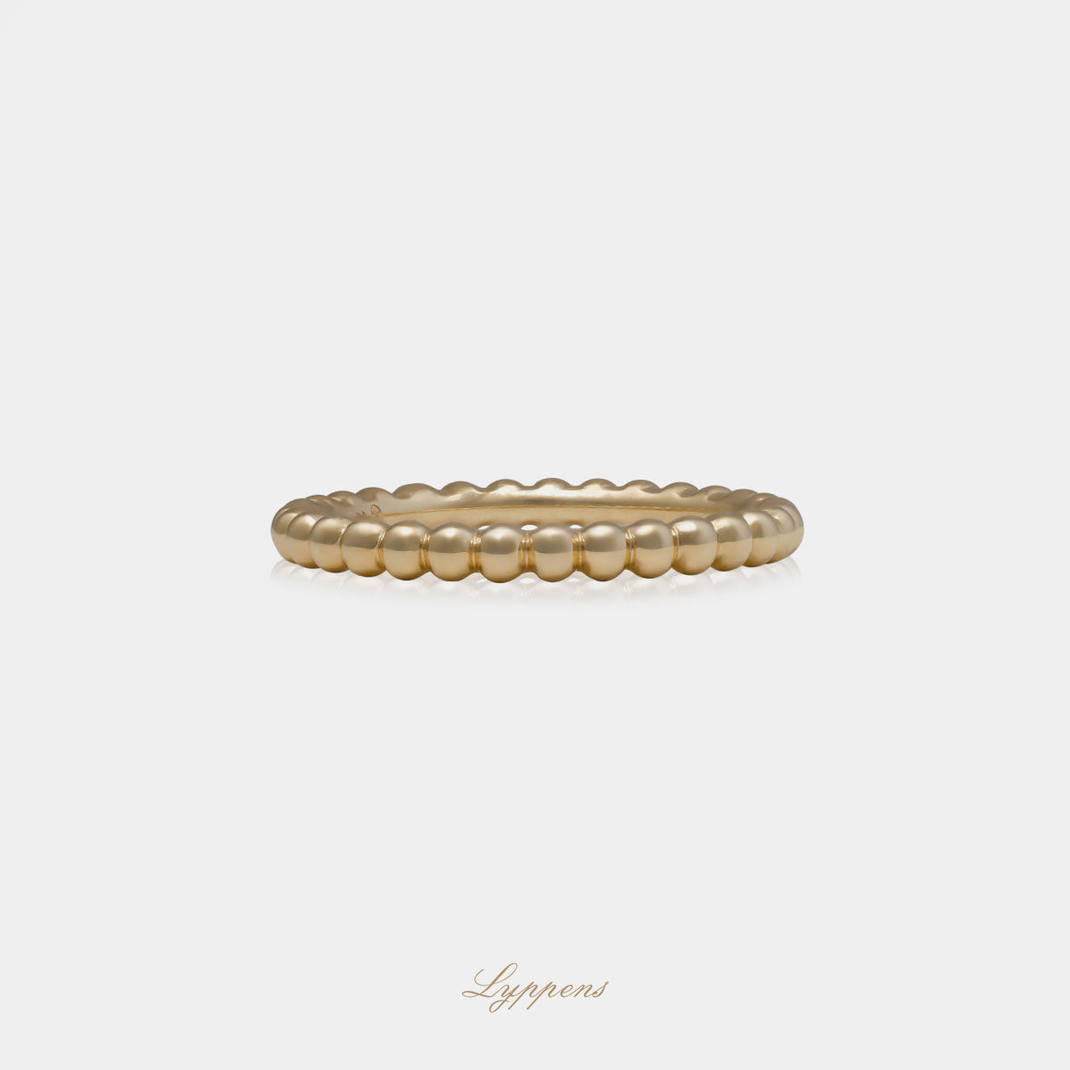 Geelgouden bolletjes ring met een breedte van 2.2mm.