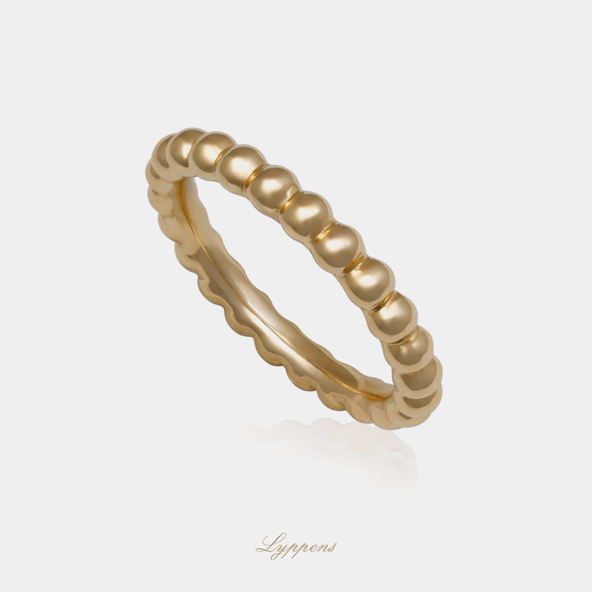 Geelgouden bolletjes ring met een breedte van 3.1mm.