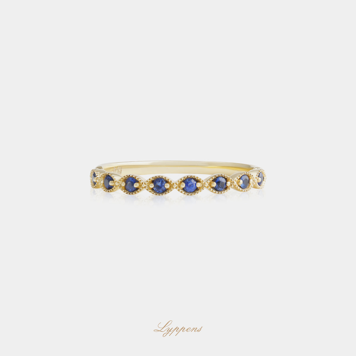Yellow gold half eternity ring with sapphires