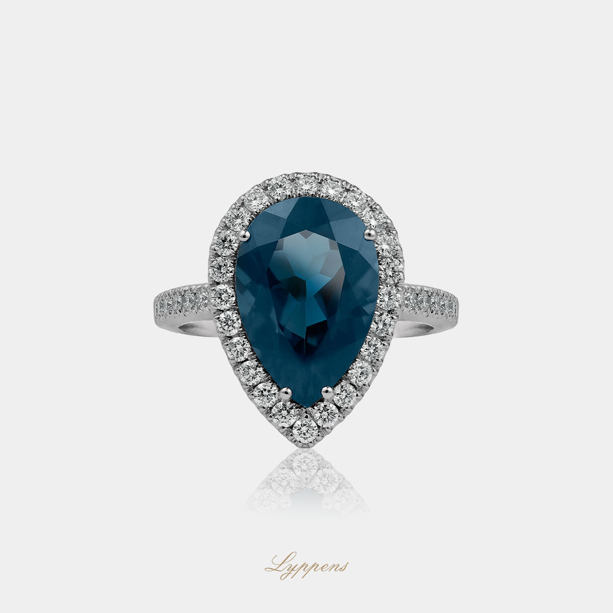 White gold entourage ring with topaz and diamonds