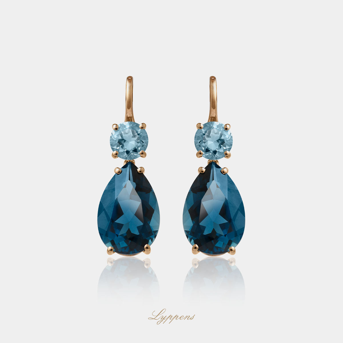 Rose gold earrings with topaz