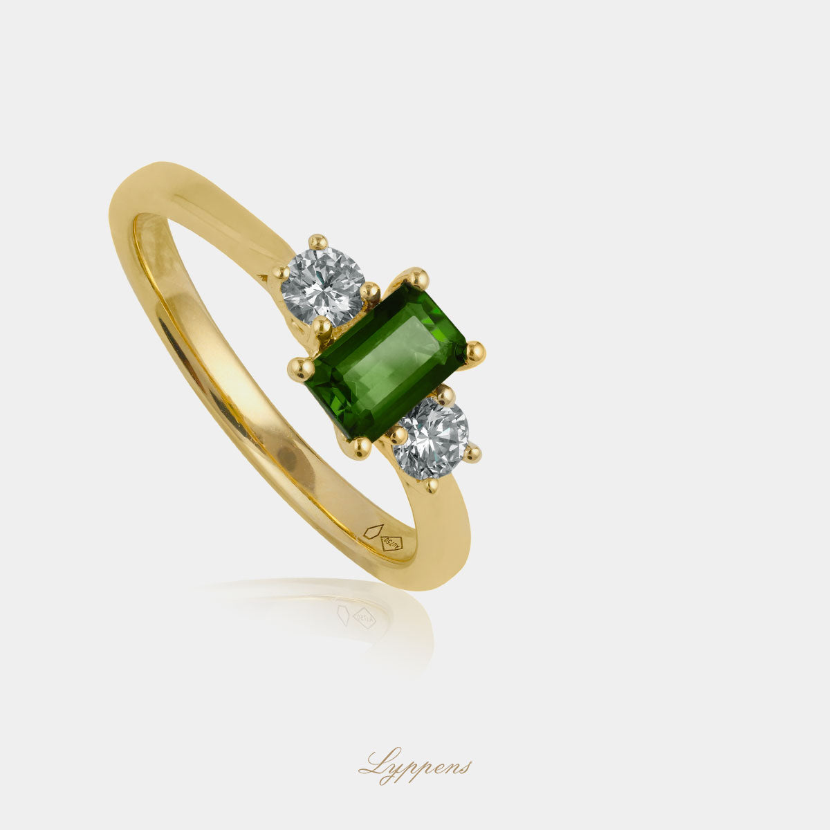 Yellow gold three-stone ring with tourmaline and diamonds