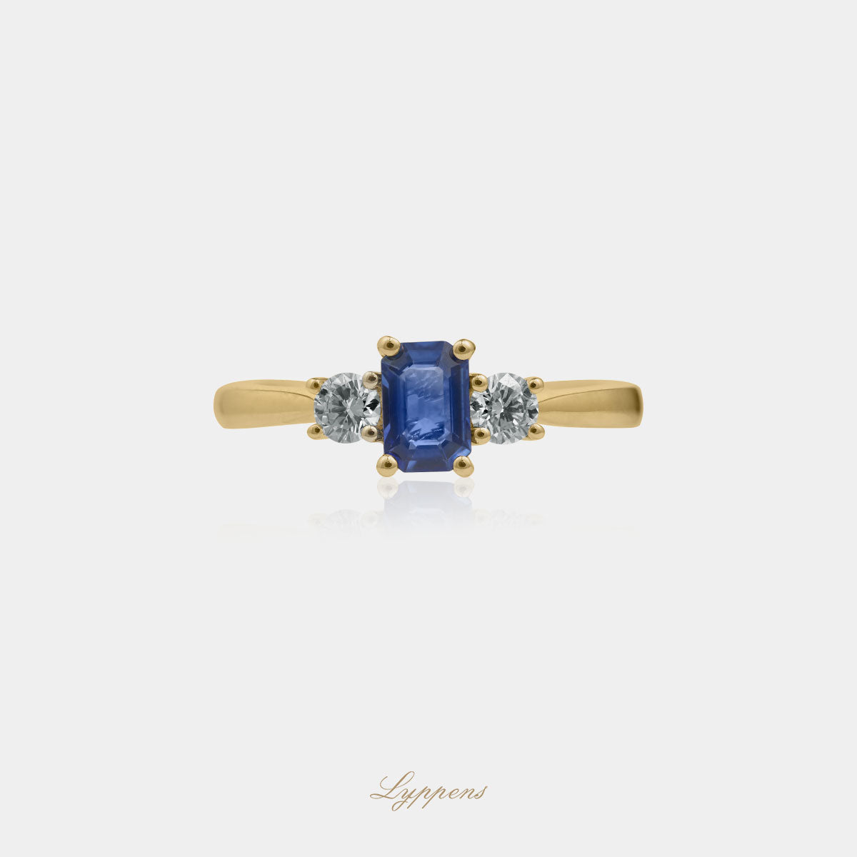Yellow gold three-stone ring with sapphire and diamond