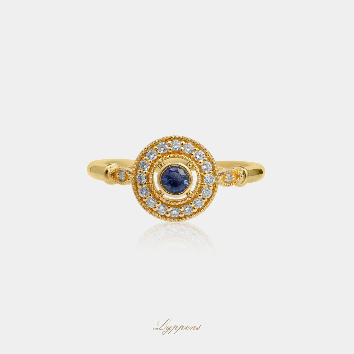 Yellow gold ring with sapphire and diamonds
