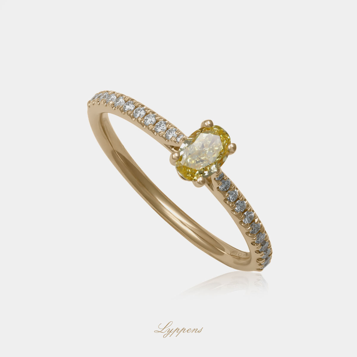 Exclusieve 18kt geelgouden verlovingsring met 0.39ct fancy yellow diamant en pavé diamanten