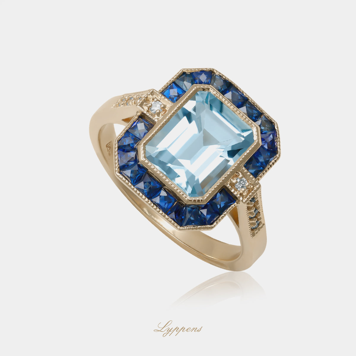 14kt geelgouden ring met topaas in entourage van saffier en diamanten op de scheen