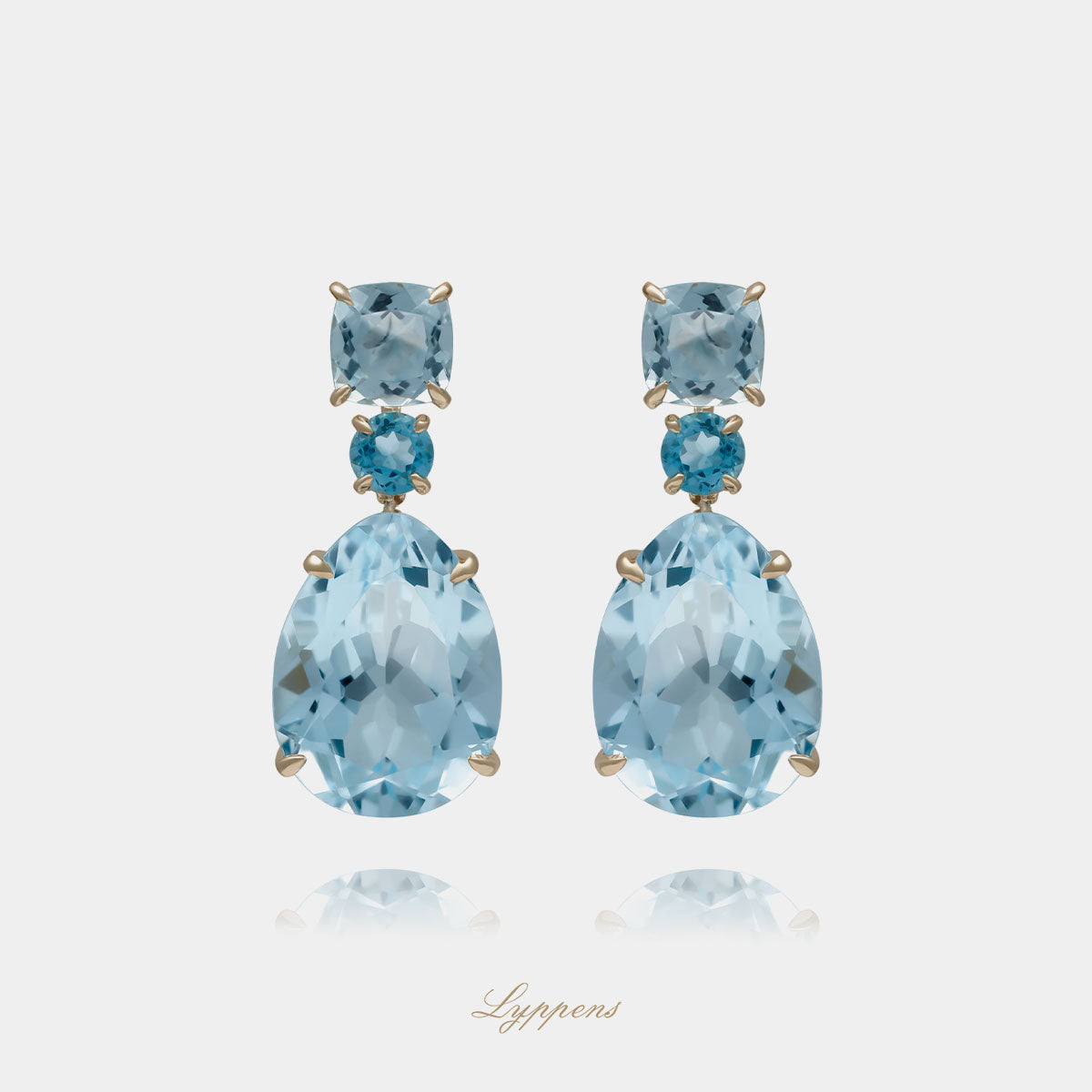 14kt geelgouden oorhangers met cushion en rond geslepen topaas en druppelvormige topaas