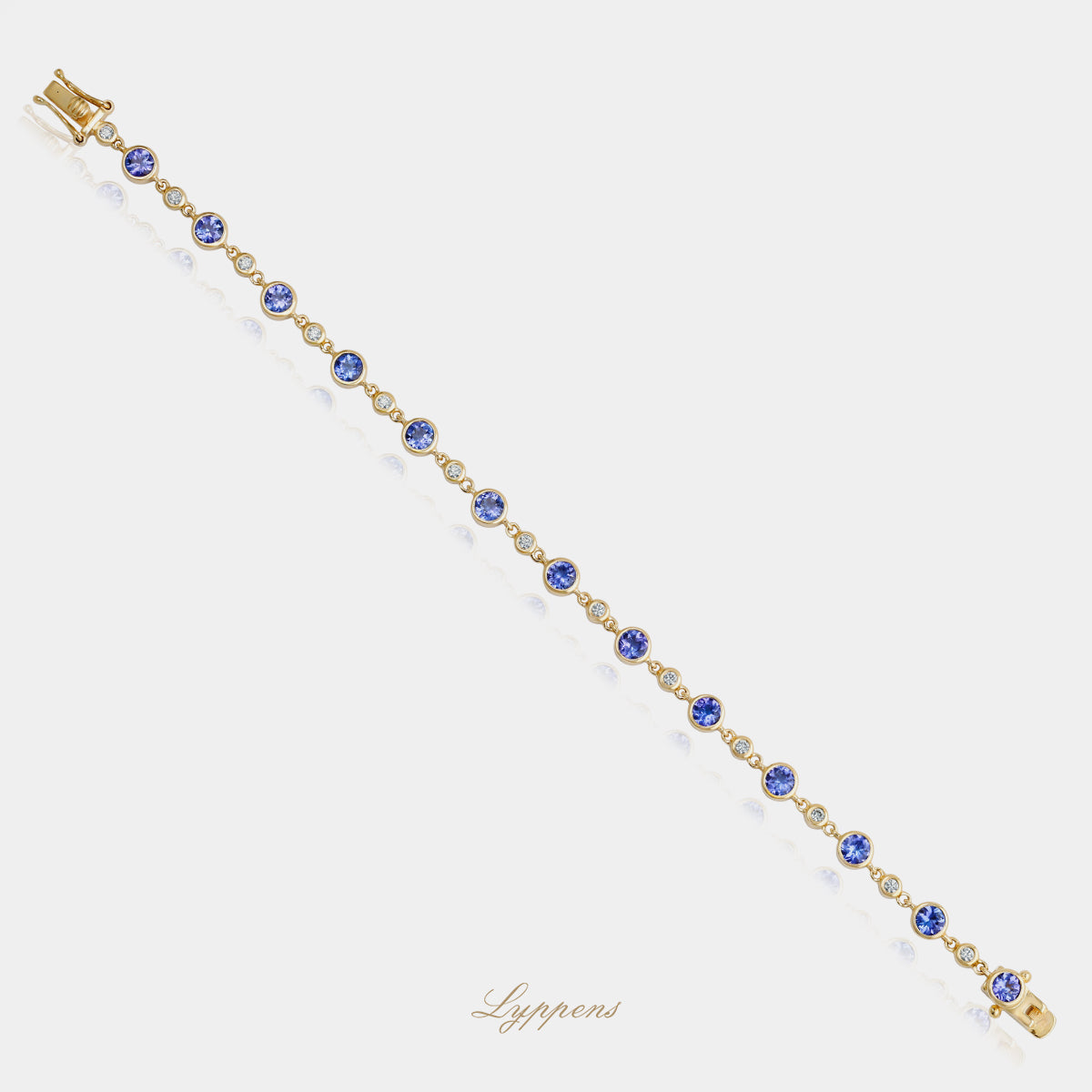 14kt geelgouden armband afwisselend gezet met tanzaniet en diamanten