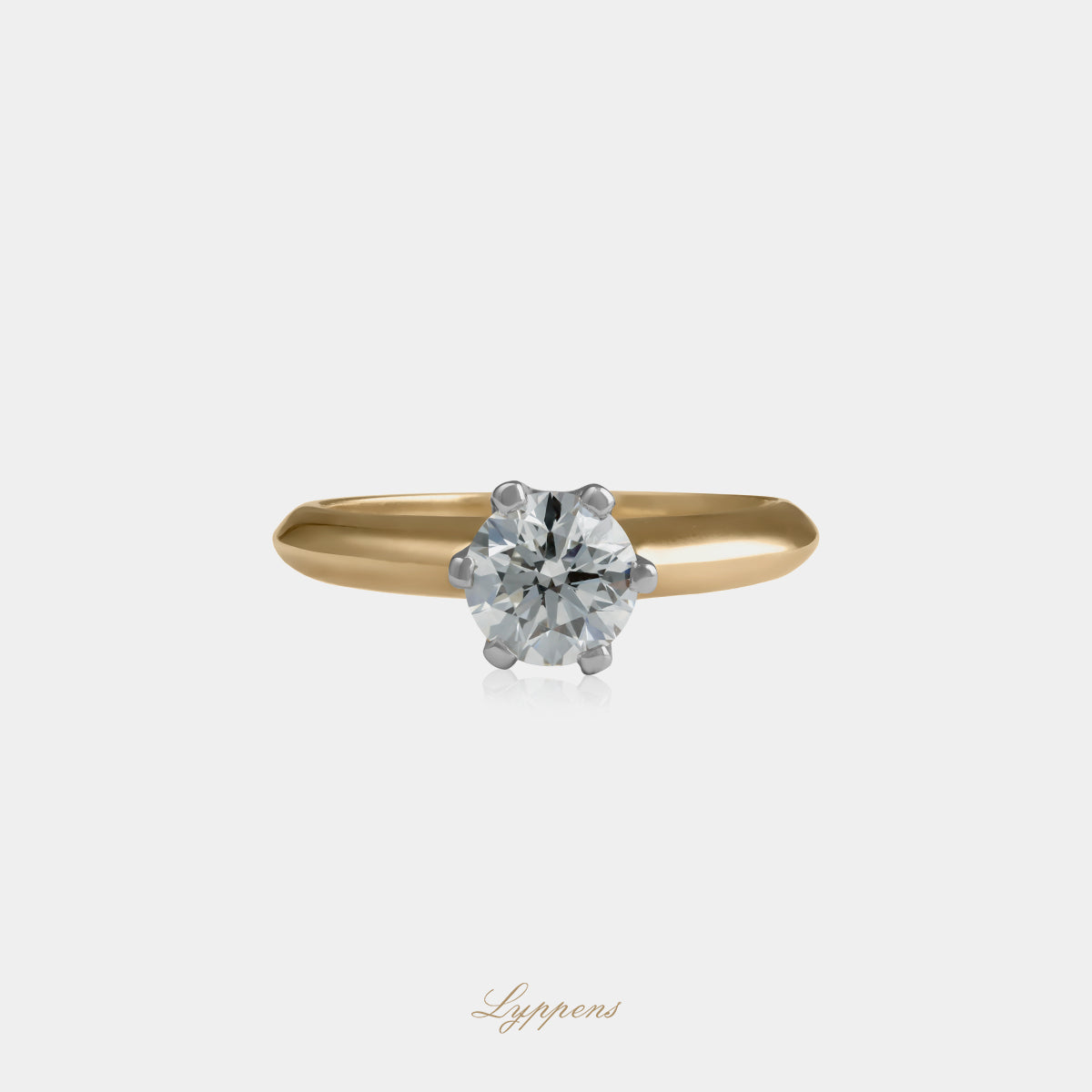 18kt geel- en witgouden solitair ring met 1.14ct GIA gecertificeerde briljant geslepen diamant in zes poots chaton