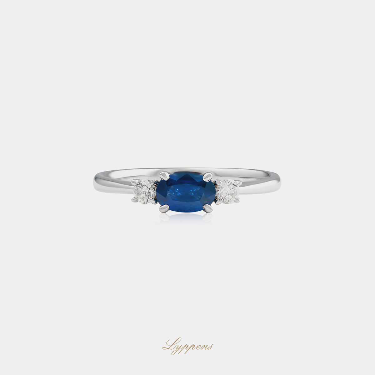 18kt witgouden ring met ovaal geslepen saffier en 0.14ct briljant geslepen diamanten