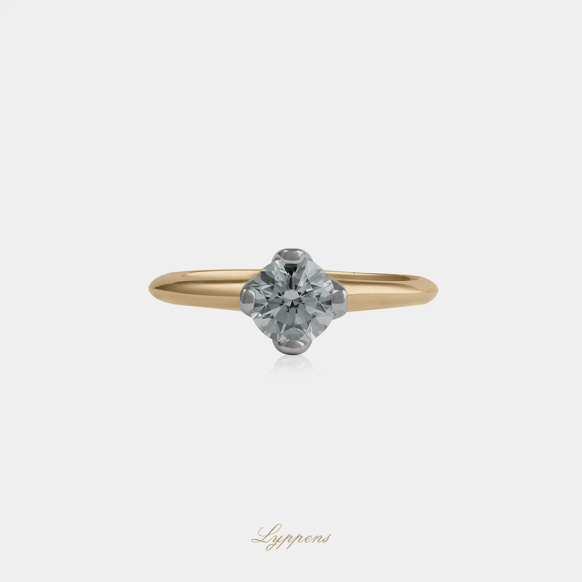 18kt geel- en witgouden solitair ring met 0.70ct briljant geslepen GIA diamant in Barcelona montuur
