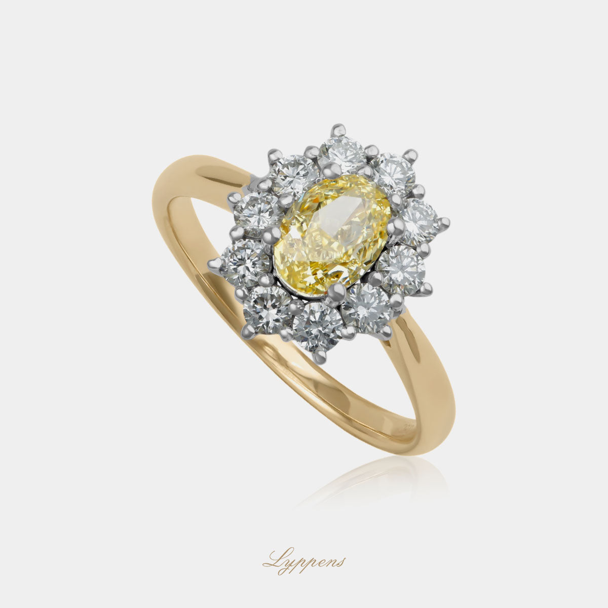 bicolor 18kt verlovingsring met fancy intense yellow diamant in briljant entourage