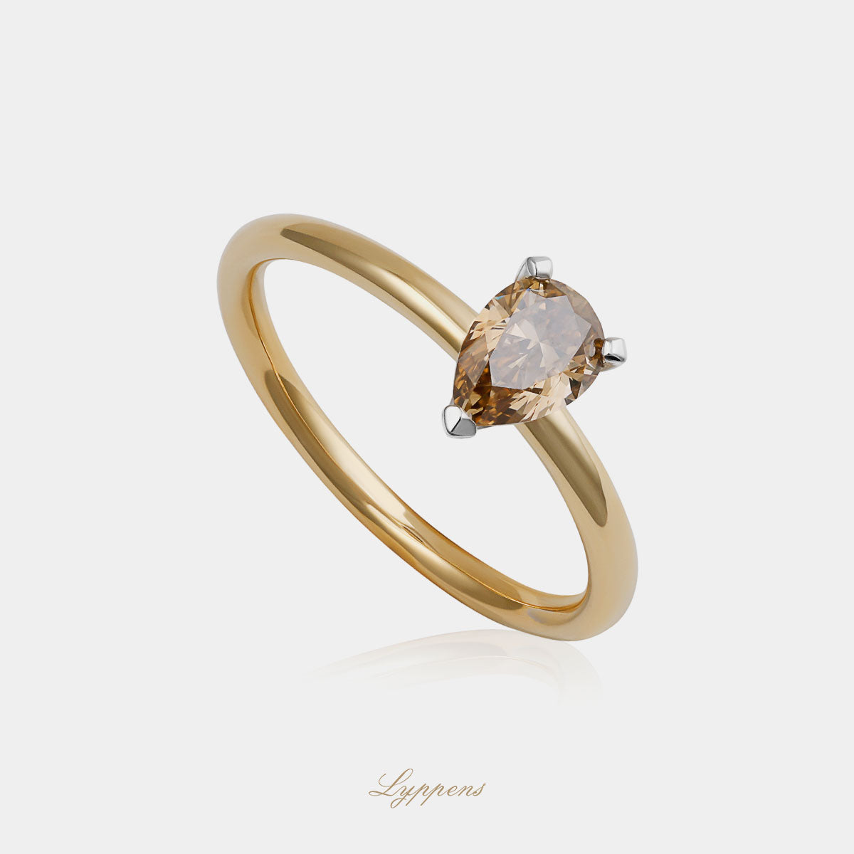 bicolor 18kt verlovingsring met peer geslepen bruine diamant