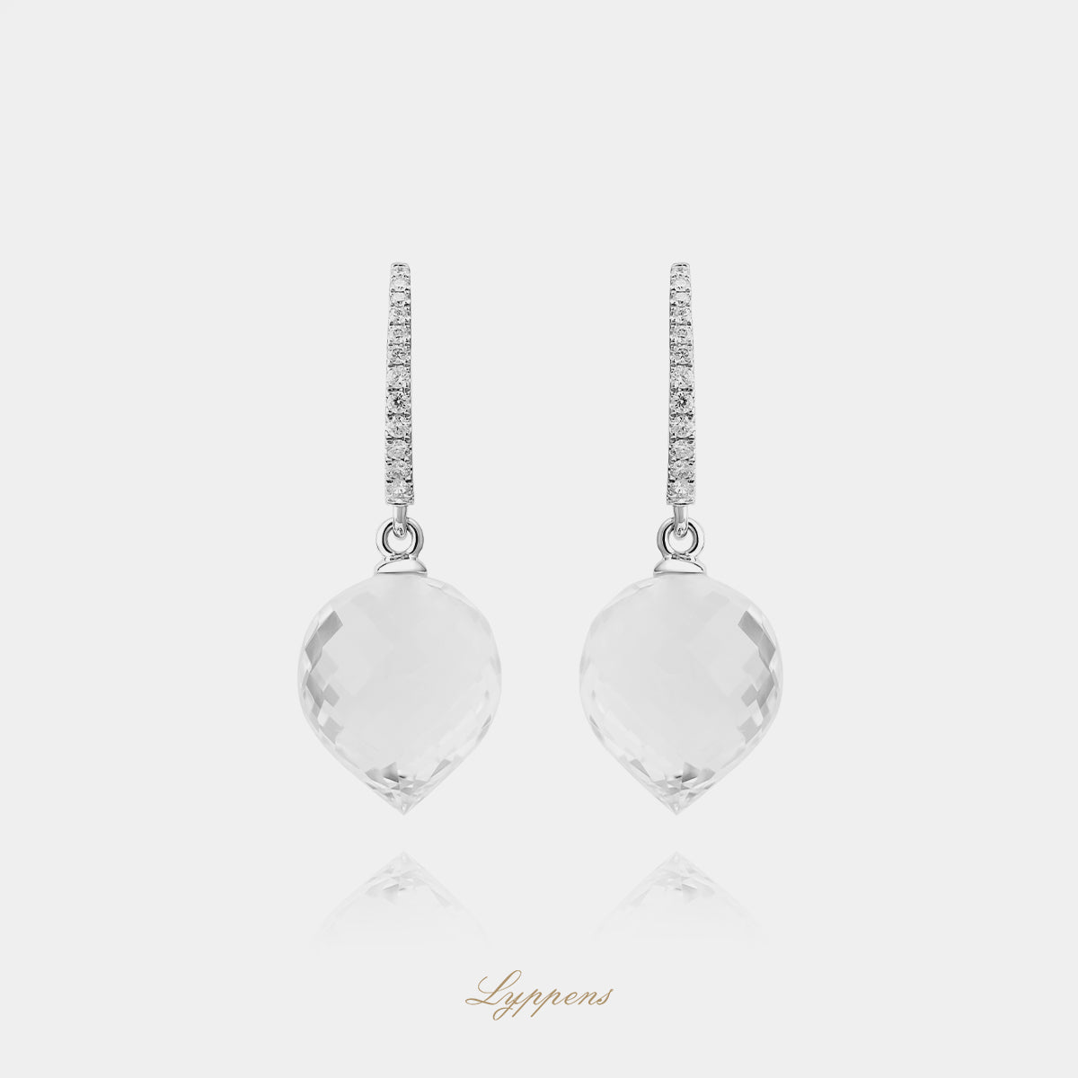 14kt witgouden oorringen met briljant diamant 0.17ct H SI en druppelvormige bergkristal