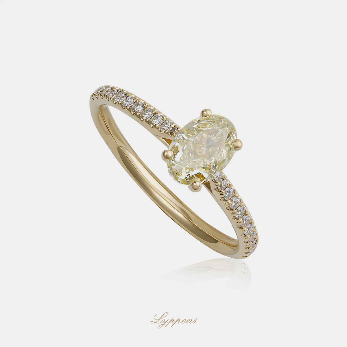 Geelgouden solitair ring met fancy yellow en witte diamant