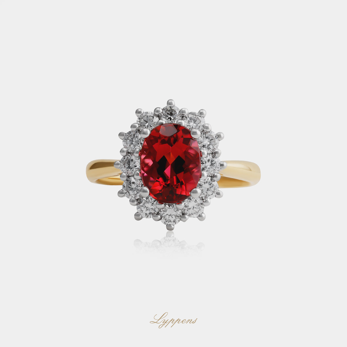 18kt geel- en witgouden entourage ring met ovaal toermalijn en diamant halo 0.75ct G SI1