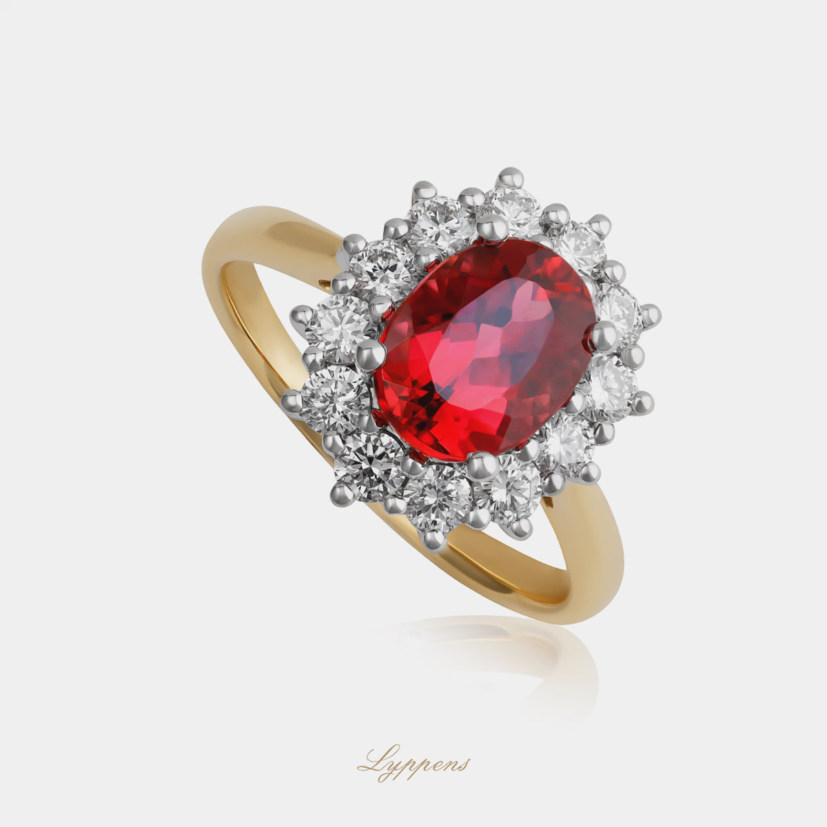 18 karaat geel witgouden ring met toermalijn en briljant geslepen diamant entourage 0.75ct