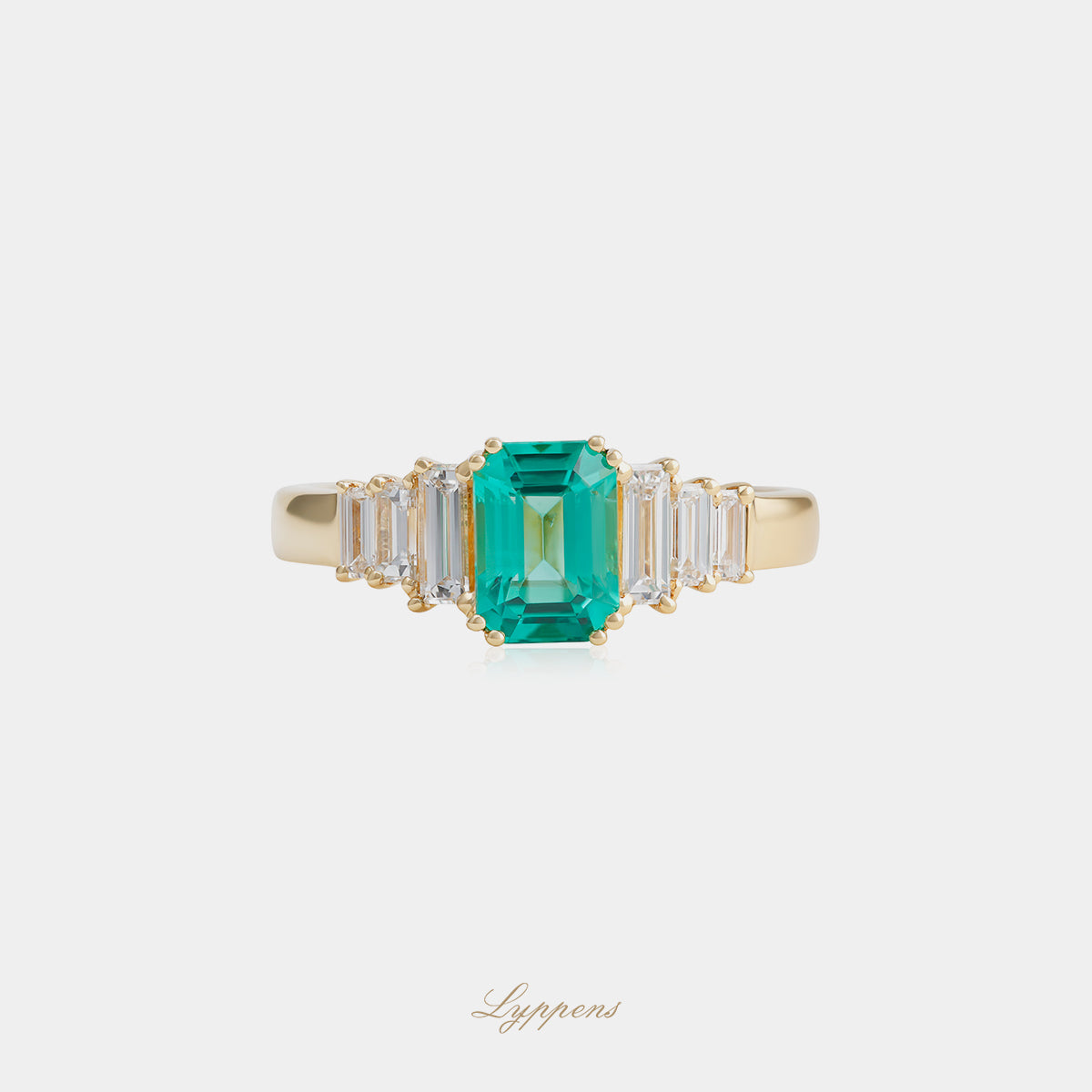 18kt geel- en witgouden ring met emerald smaragd 1.03ct en baguette diamant 0.46ct F VS1