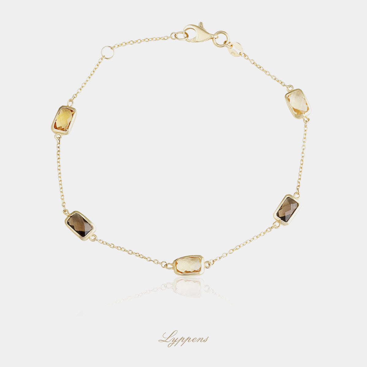 Geelgouden armband met citrien en rookkwarts