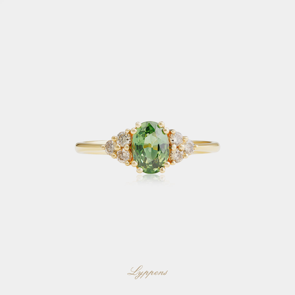 Geelgouden ring met groene saffier en bruine diamant