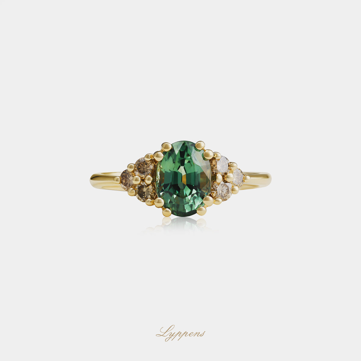Geelgouden ring met groene saffier en bruine diamant