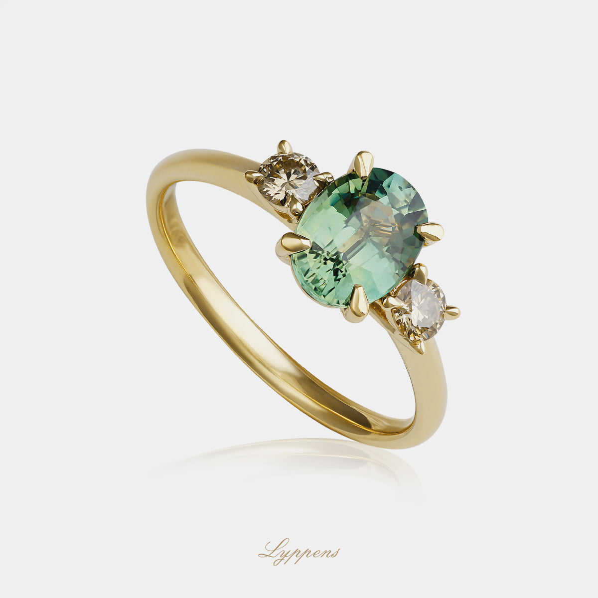 Geelgouden ring met groene saffier en bruine diamant