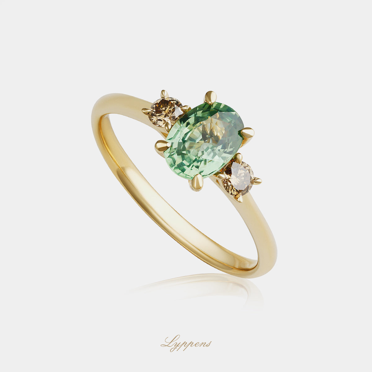 Geelgouden ring met groene saffier en bruine diamant
