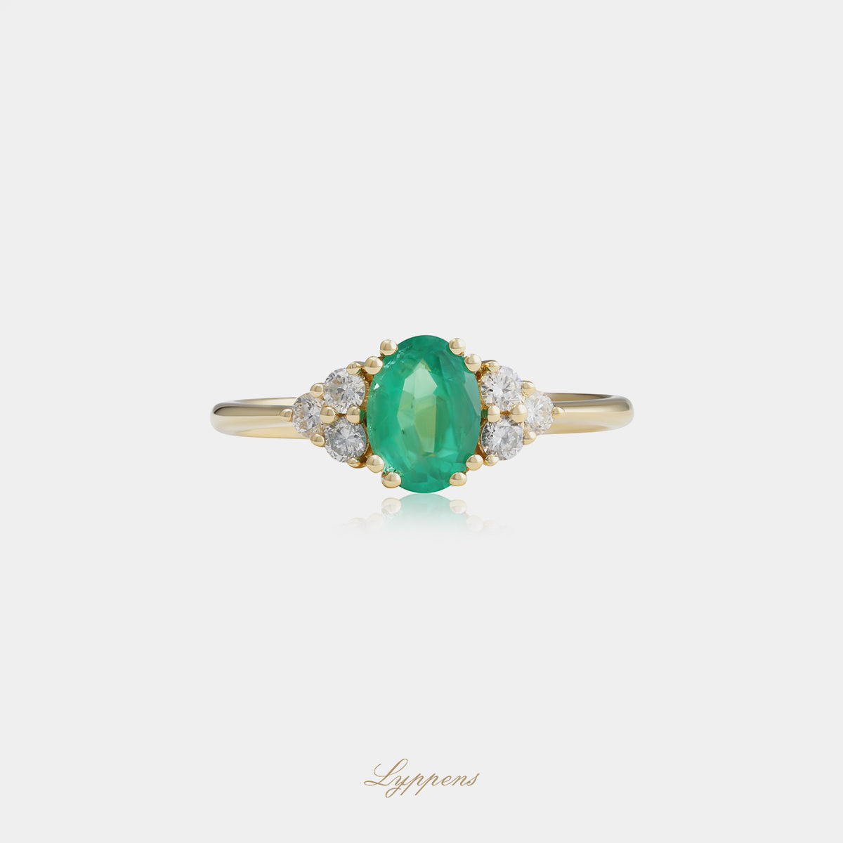 Geelgouden ring met smaragd en diamant