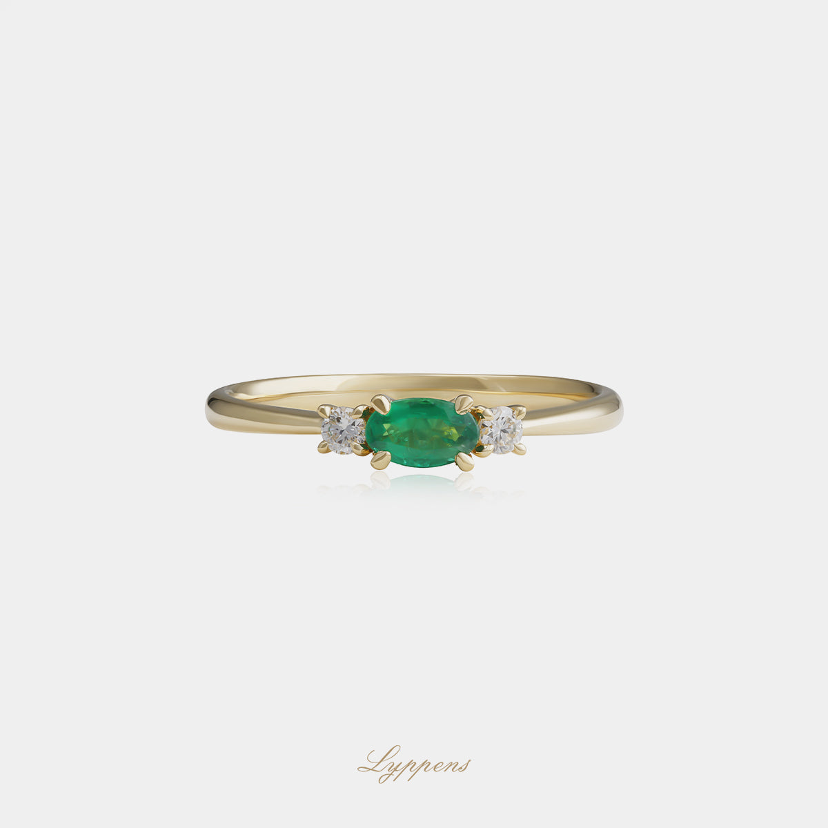Geelgouden ring met smaragd en diamant