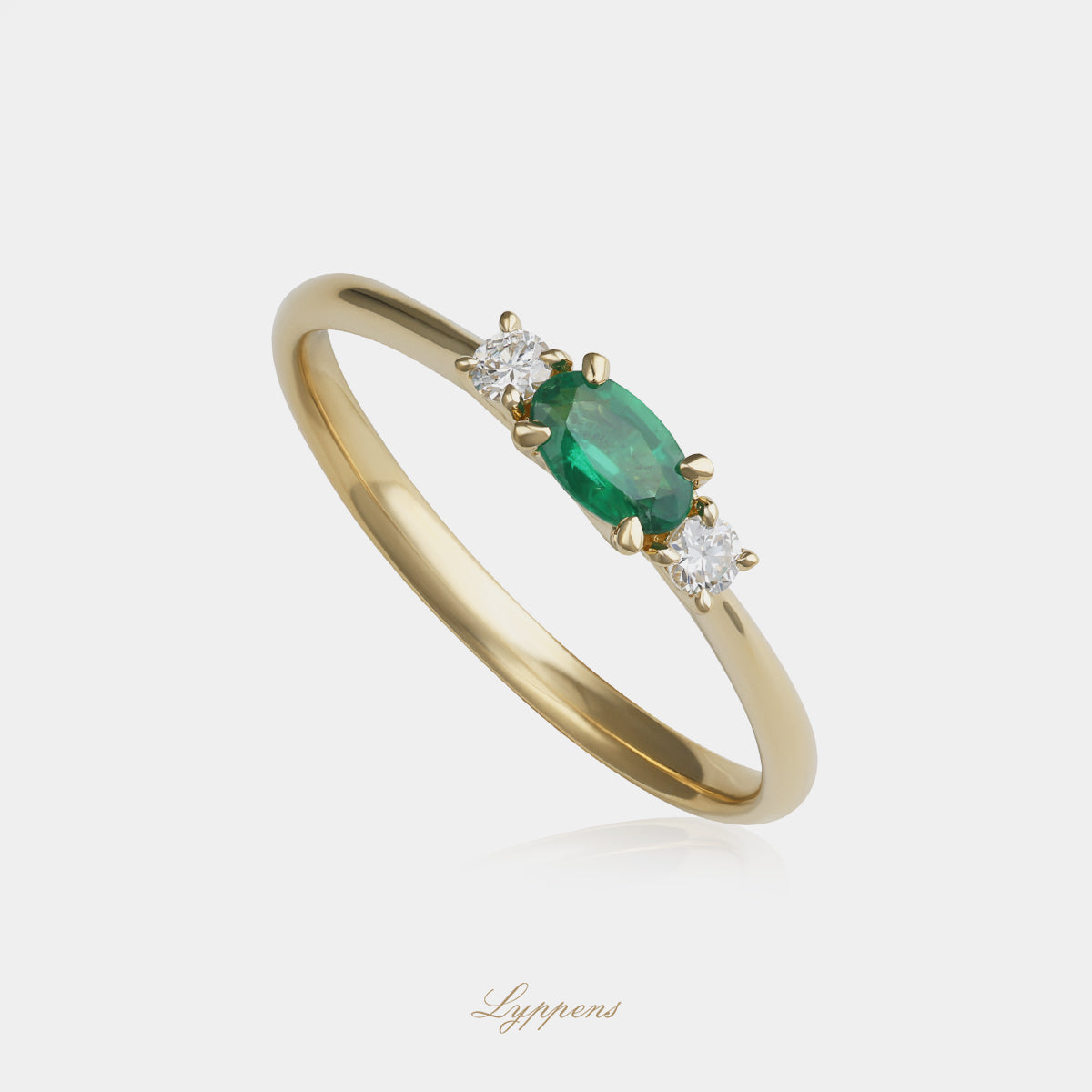 Geelgouden ring met smaragd en diamant