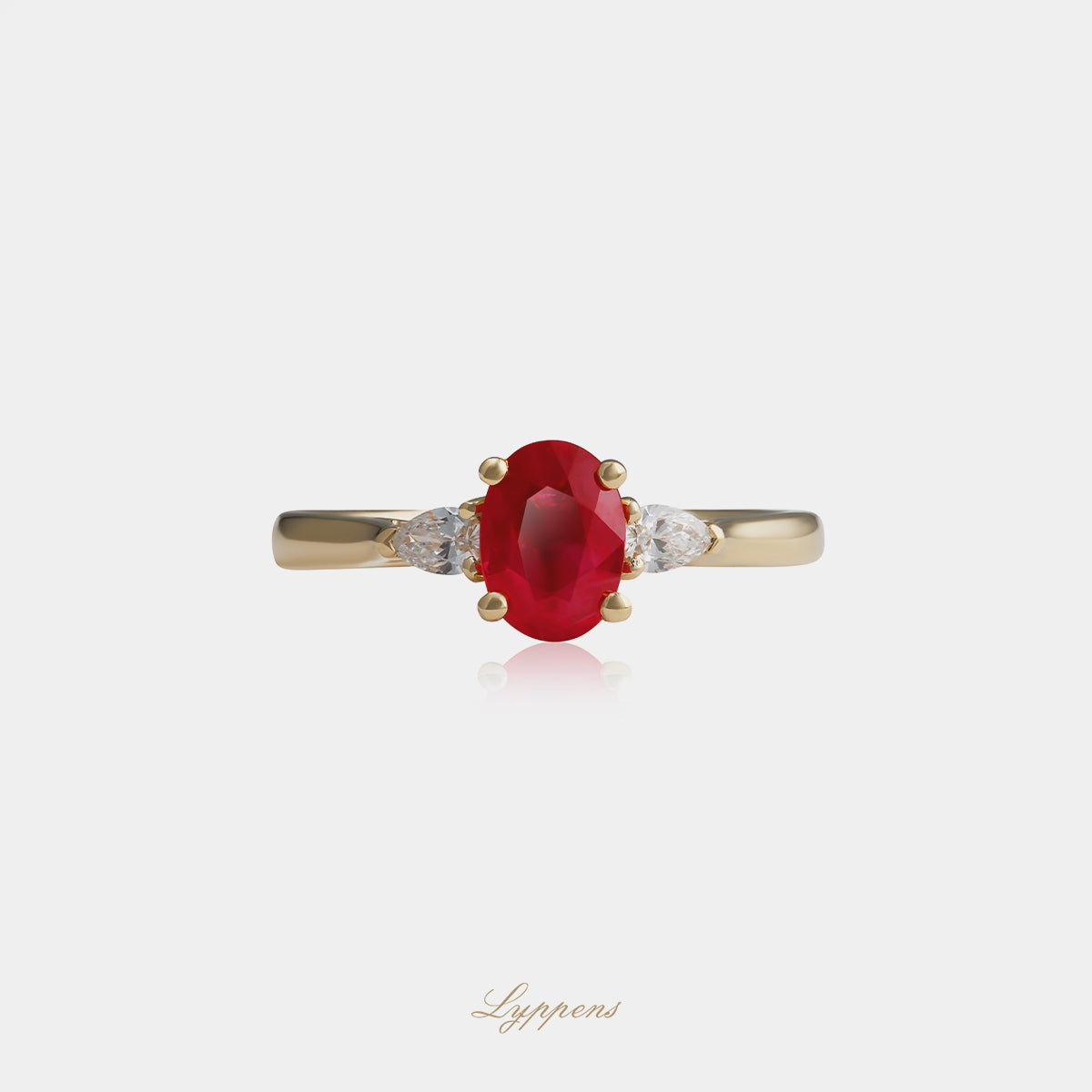 Yellow gold three-stone ring with ruby and diamonds