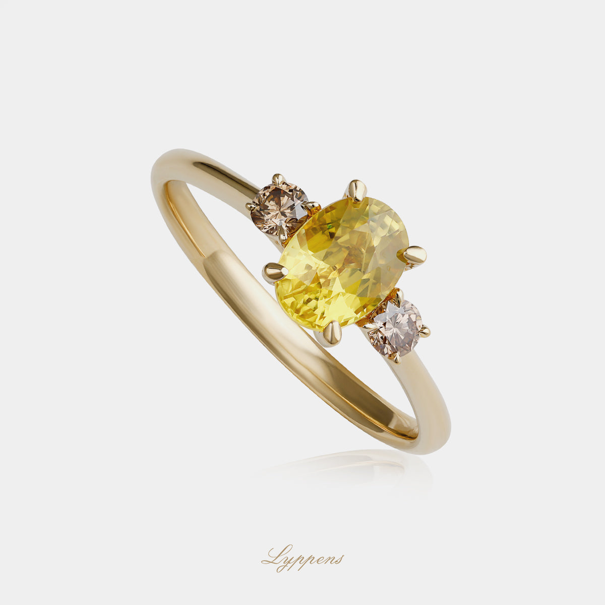 Geelgouden ring met oranje saffier en bruine diamant